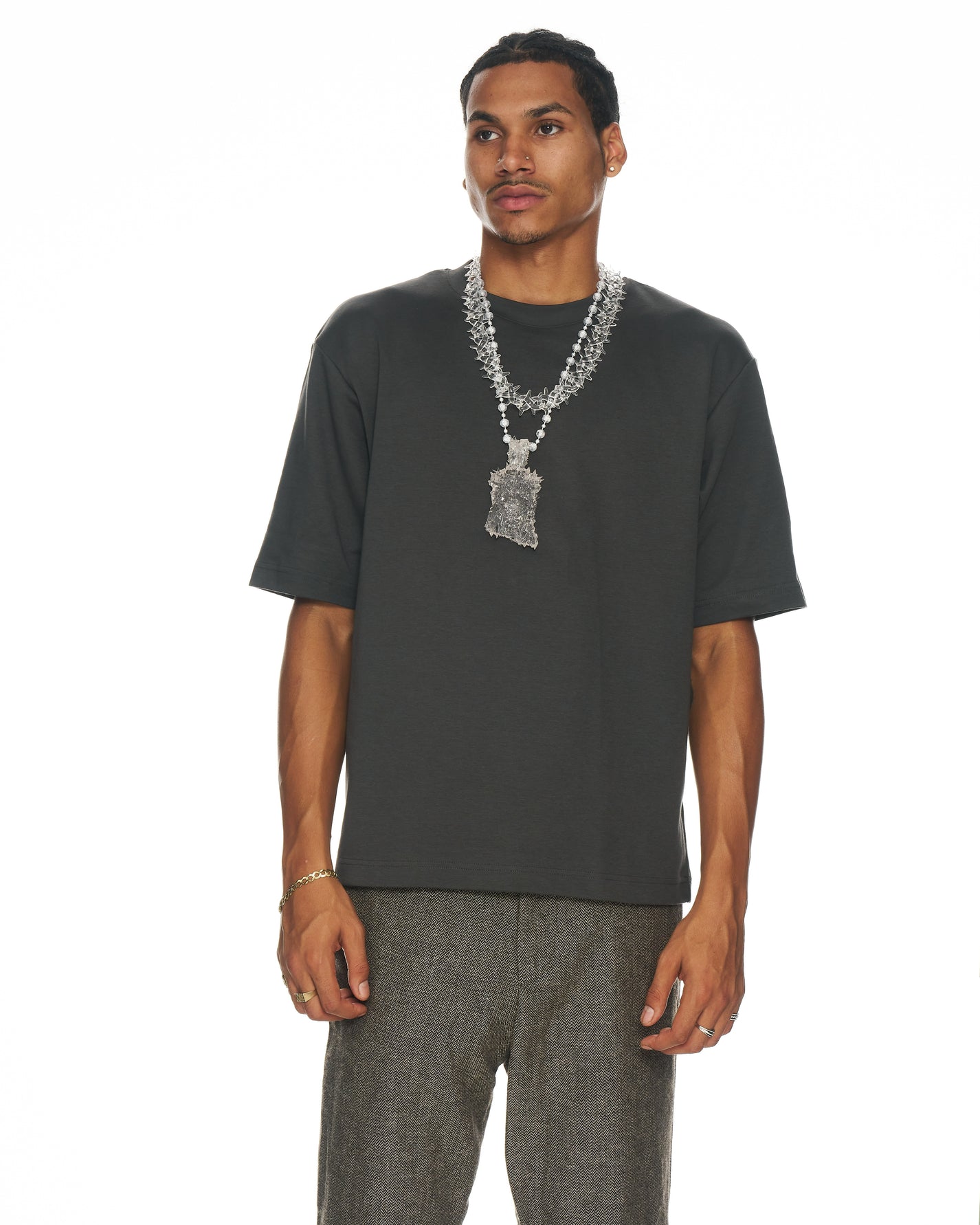 model wearing Crystal Faceless Piece pendant on clear resin chain