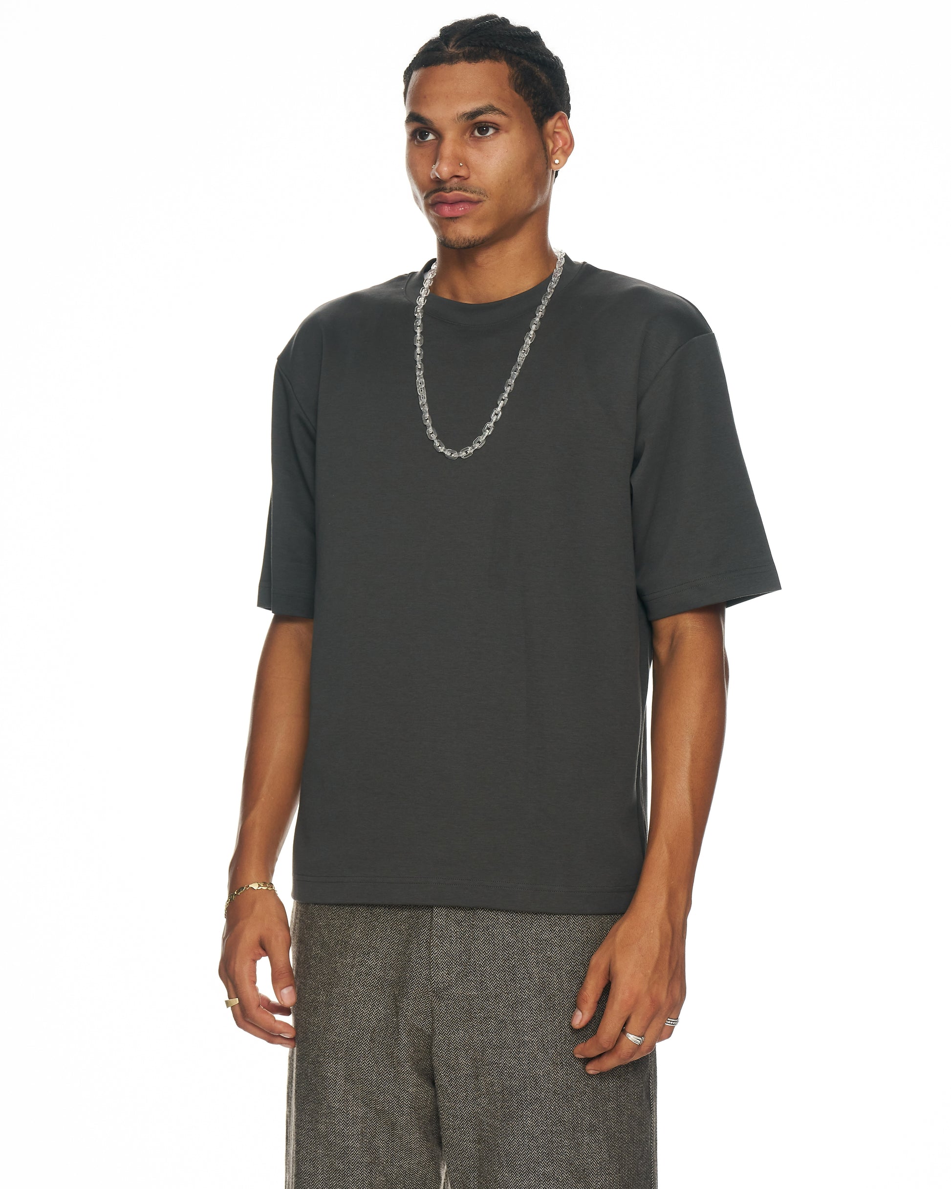 model wearing clear Odin resin link necklace with urban styling