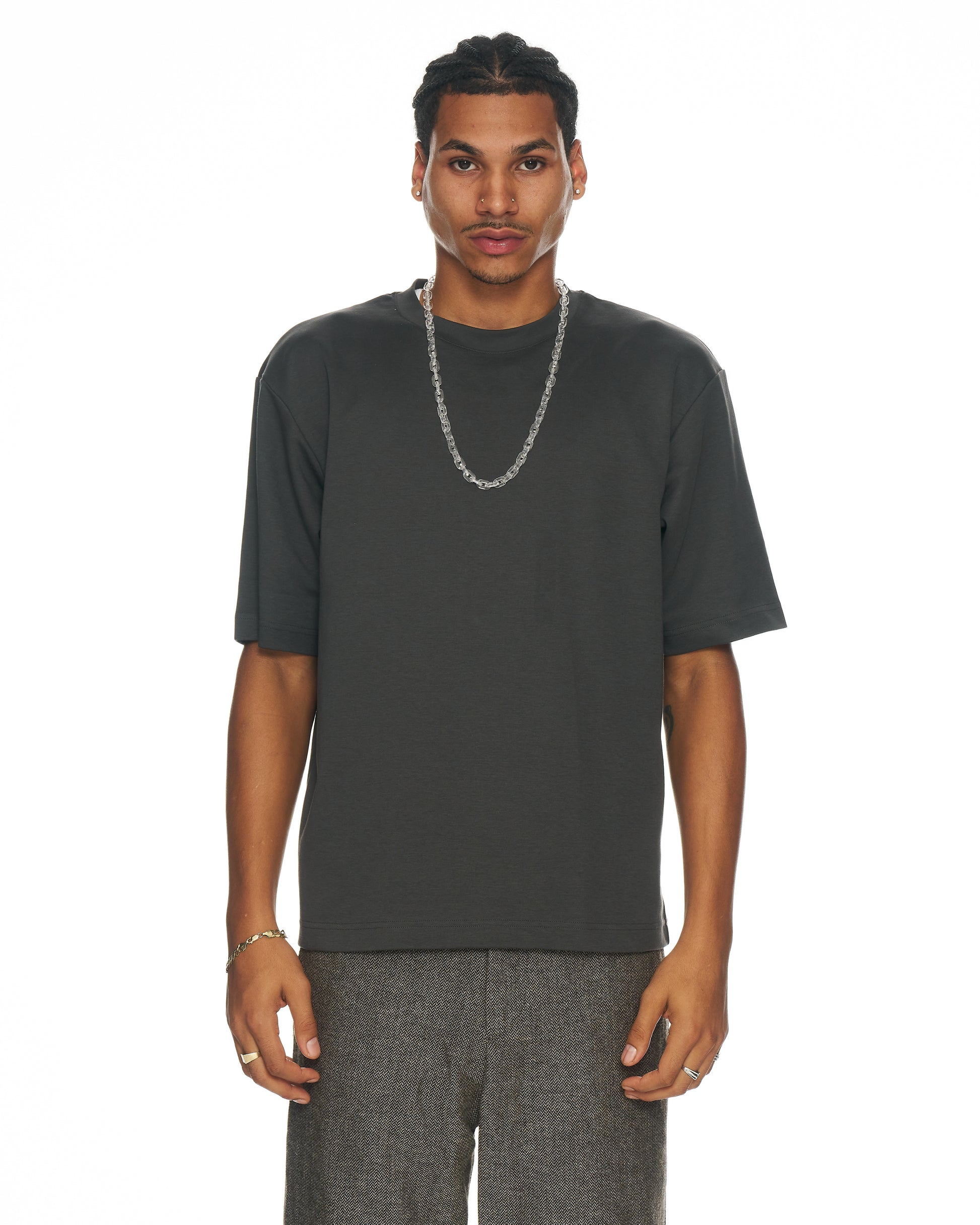 model wearing clear Odin resin link necklace with urban styling